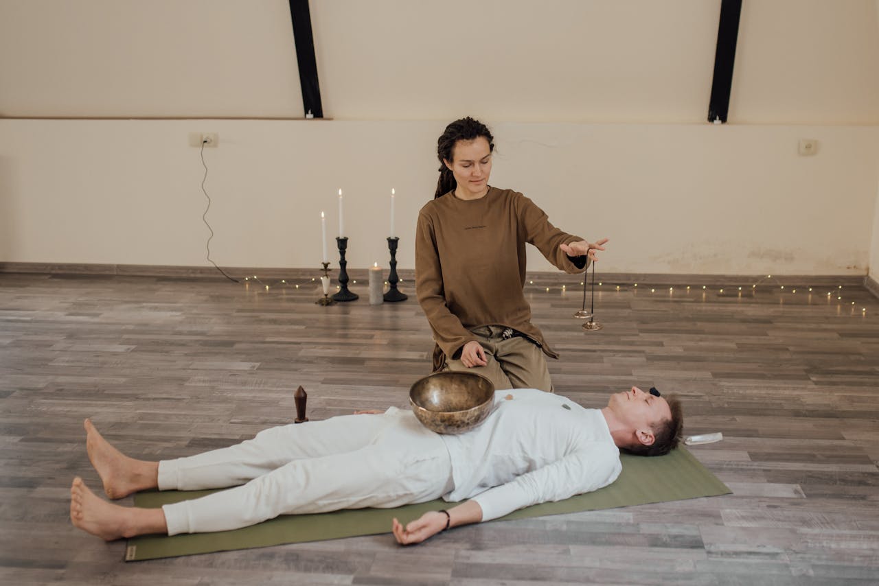 services-06 A peaceful meditation session using a Tibetan singing bowl for holistic wellness.